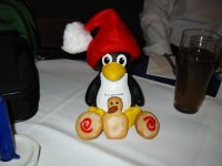 a Christmas Tux with penguin and swirl cookies